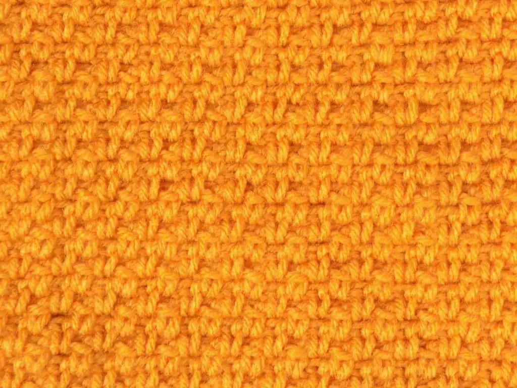 Linen stitch texture in marigold yarn