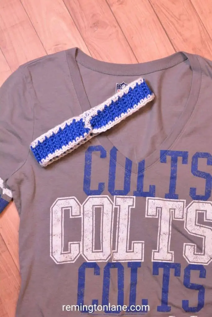 Grey Indianapolis Colts women's t-shirt with a crochet blue and white headband laying on top