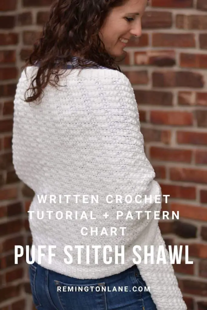 Textured crochet wrap with diagonal stripes.
