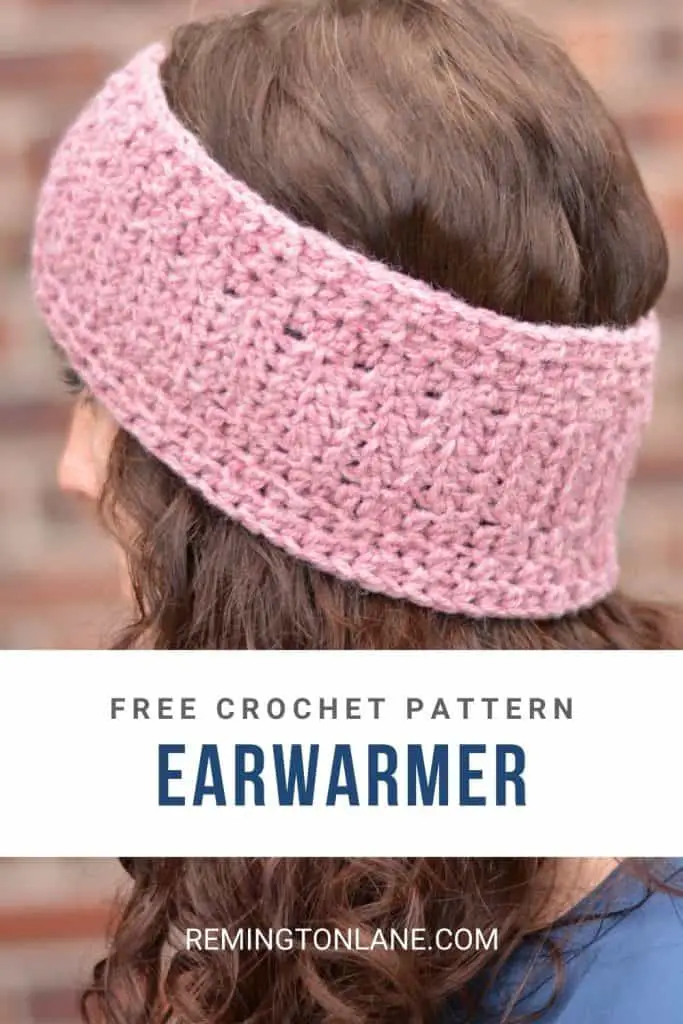 The rear view of a brunette wearing a dusty pink crochet headband