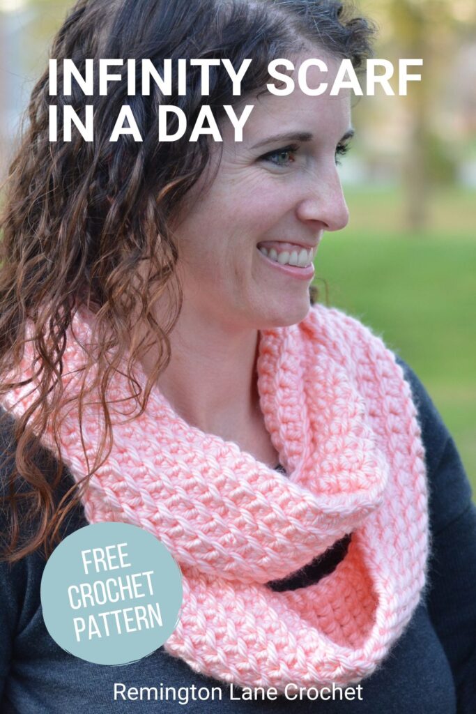woman wearing a light pink crochet infinity scarf