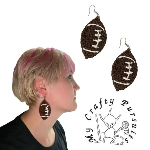 Woman wearing American football earrings