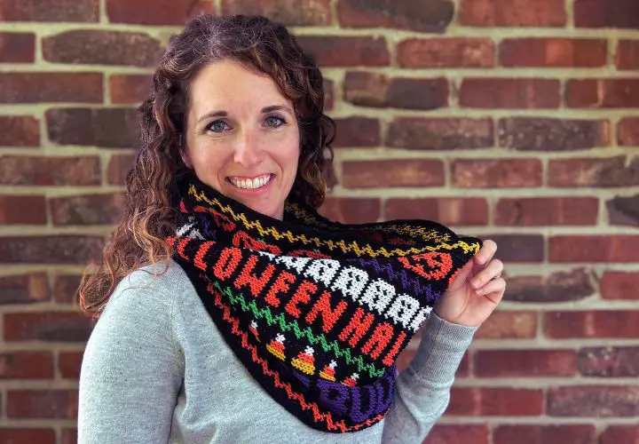 A friendly young woman modeling a Halloween-themed cowl