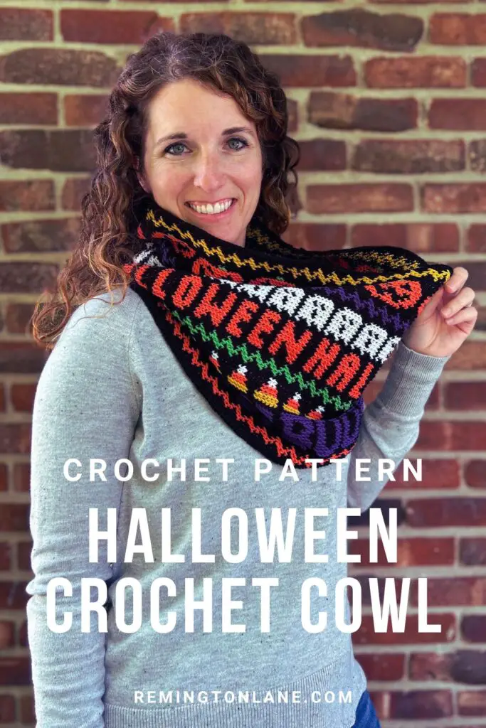 A woman weather the crochet Halloween cowl as a reminder to save this pattern for later