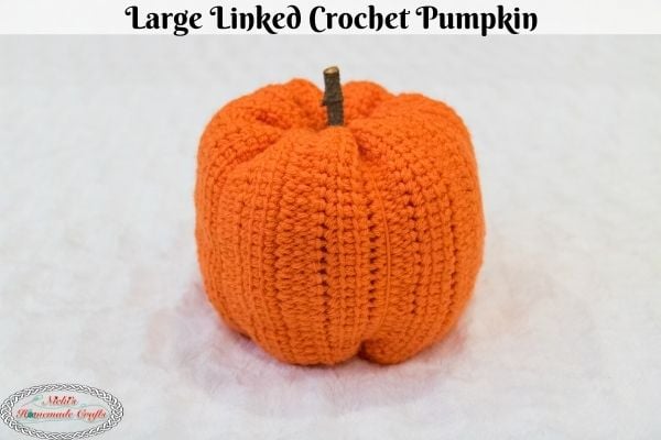 https://remingtonlane.com/wp-content/uploads/2023/10/Large-Crochet-Pumpkin-Pattern.jpg?ezimgfmt=rs:327x218/rscb7/ng:webp/ngcb7